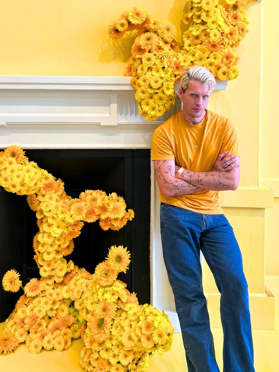 Hamish Powell among yellow gerberas Hamish Powell among yellow gerberas