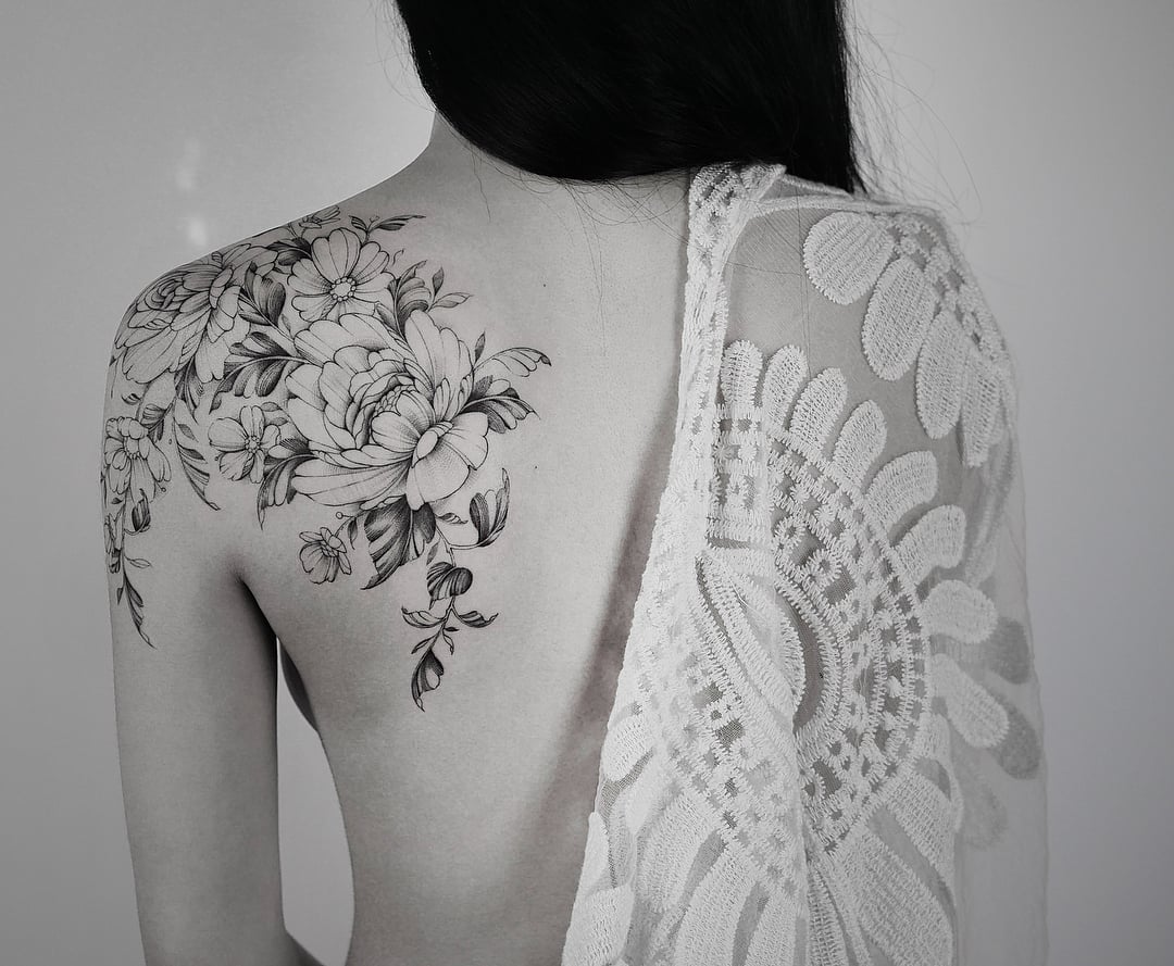 Hannah Nova Black Tattoo on back Hannah Nova Black Tattoo on back