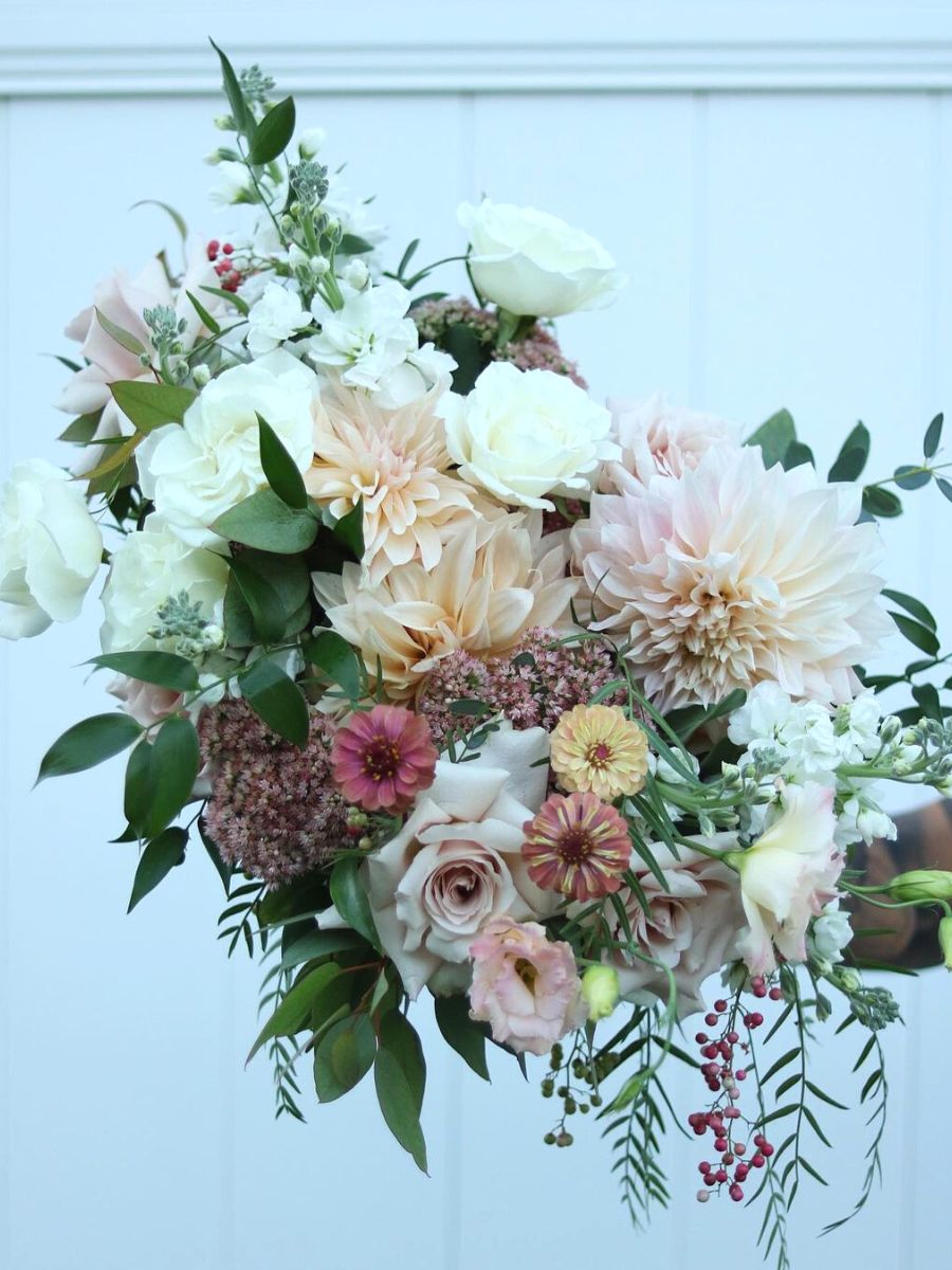 2023 wedding flower trends Textured floral bouquets with various types of flowers