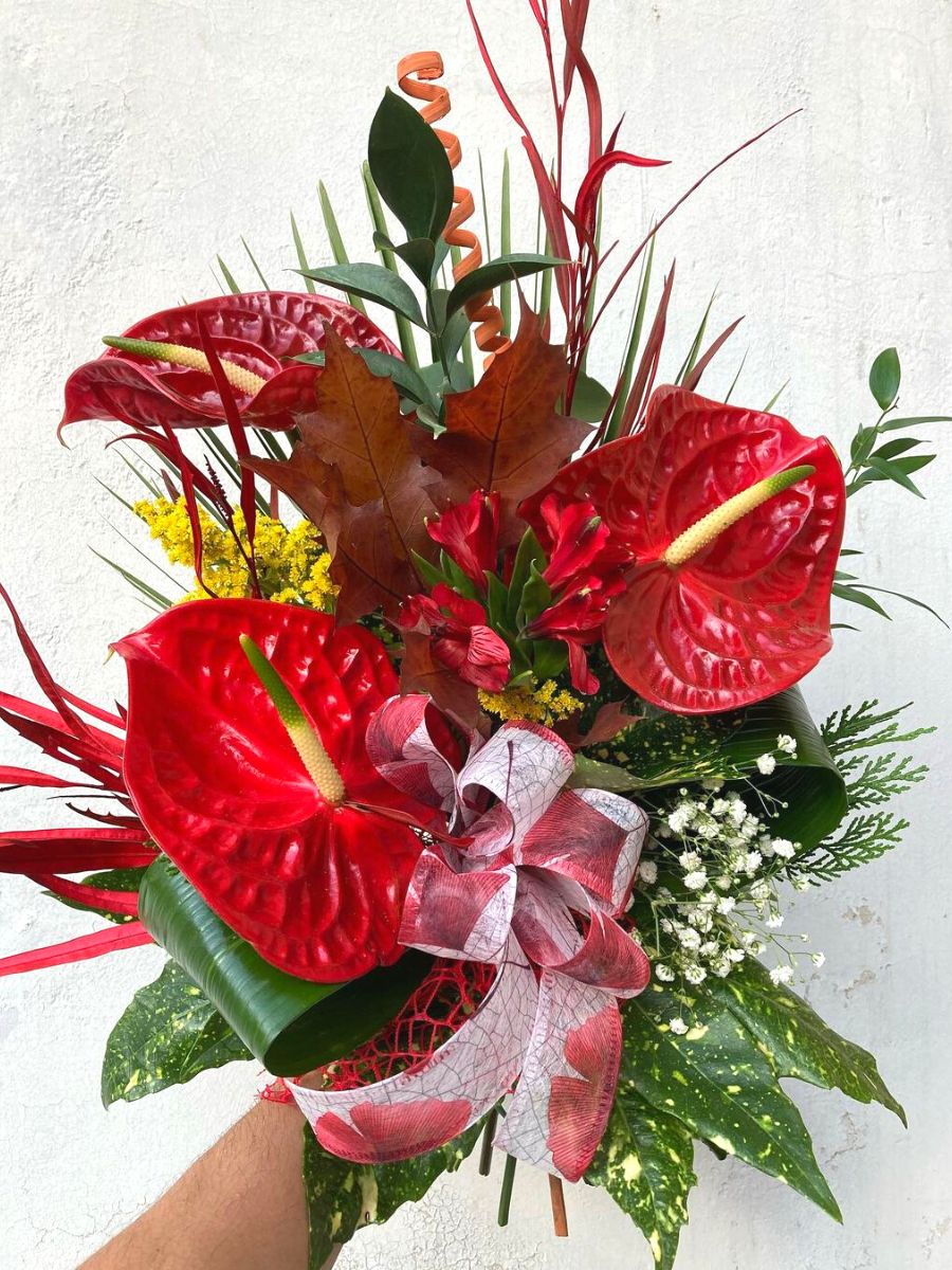 Floral arrangement with red anthuriums Floral arrangement with red anthuriums