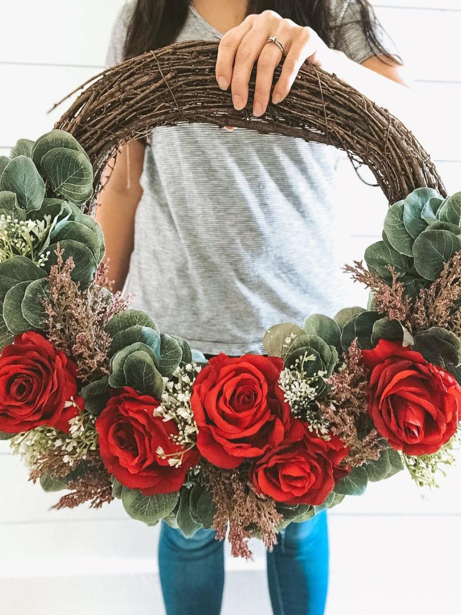 Traditional red rose with dried flowers and greenery Vday wreath