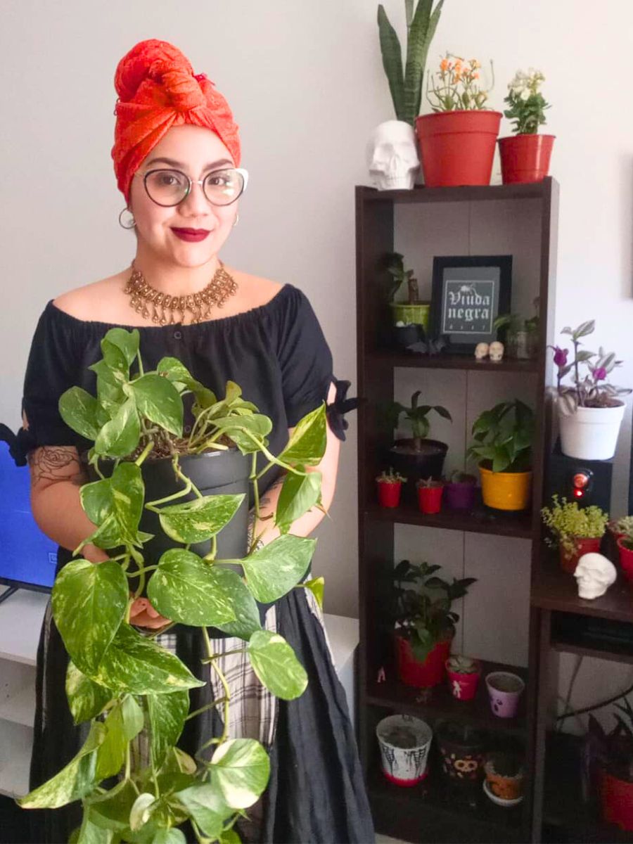 Girl with a pothos plant Girl with a pothos plant